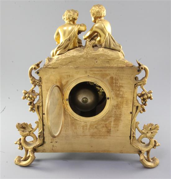 A mid 19th century French porcelain mounted ormolu mantel clock, height 34cm